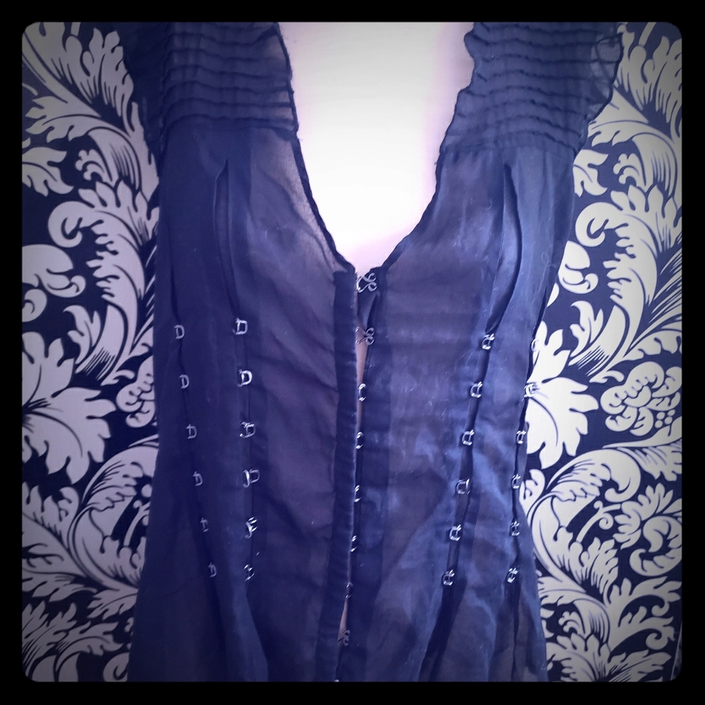 Bebe  sexy low cut gothic silver clasp sheer top